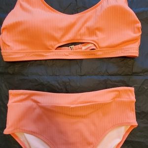 Peach bikini with gold detail and cut outs